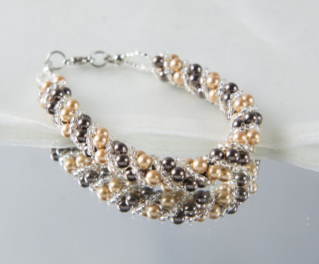ブラウン ゴールドのツイスティ スワロフスキー パール ブレスレット
