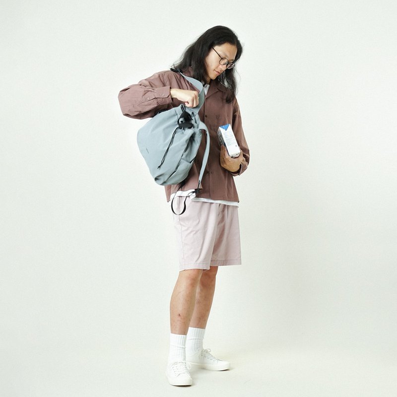 ELIO ECO Mini Everyday Totepack | Drawstring Backpack (L Size, Pale Teal) - กระเป๋าเป้สะพายหลัง - เส้นใยสังเคราะห์ สีน้ำเงิน