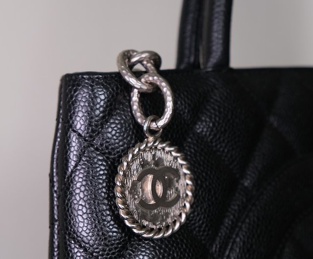 silver and black chanel bag caviar