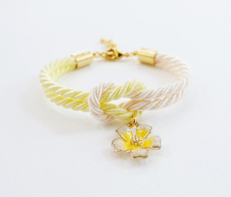 Light yellow and cream knot bracelet with flower charm - Bracelets - Other Materials Yellow