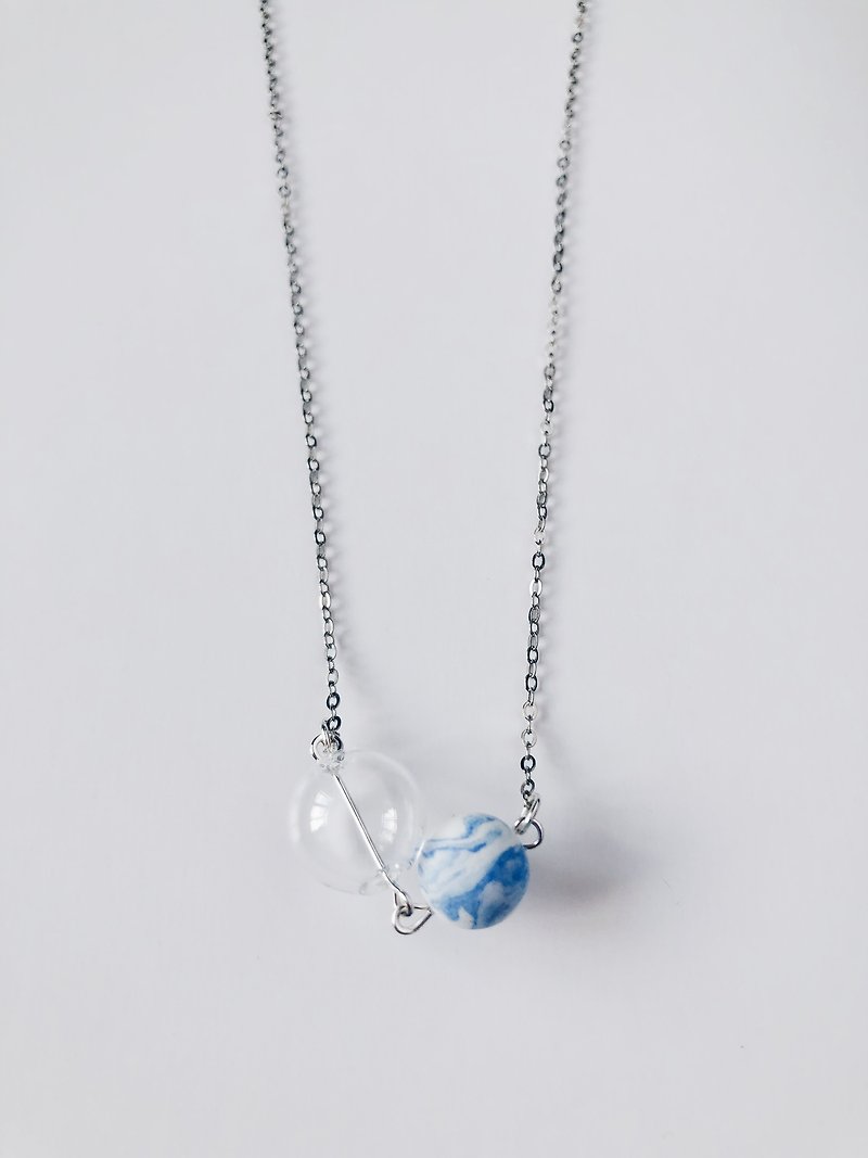 Powder blue ink light clay glass necklace