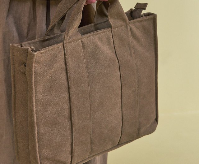 Laptop side outlet bags