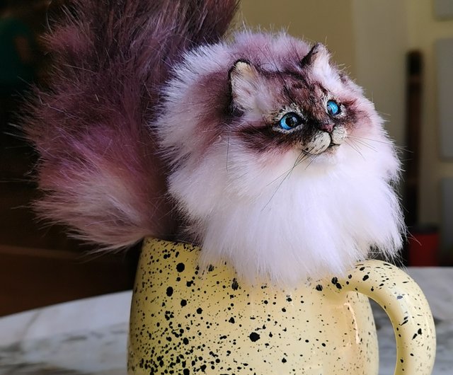 Gentleman buying Cat, needle felted poseable cat