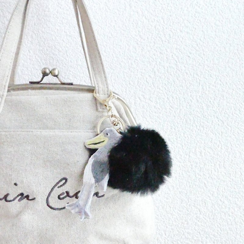 Fur pompon bag charm Black embroidered shoebill