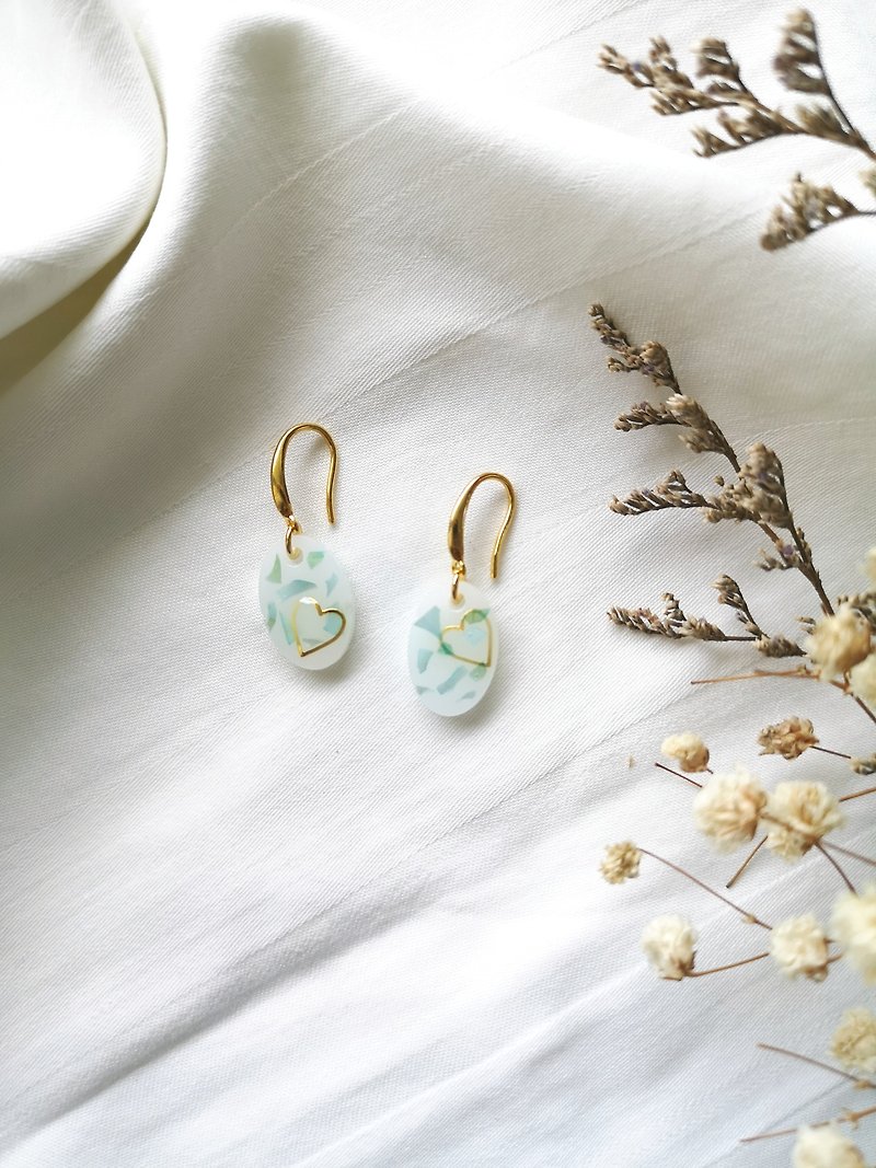 Earrings oval shape,resin with turquoise seashells silver cover by gold 18k
