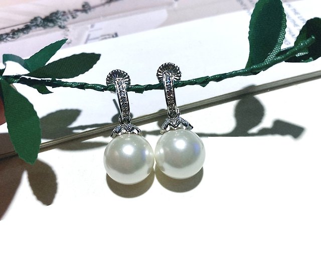 新商品 純銀ダイヤいっぱいの木の葉真珠のイヤリングです