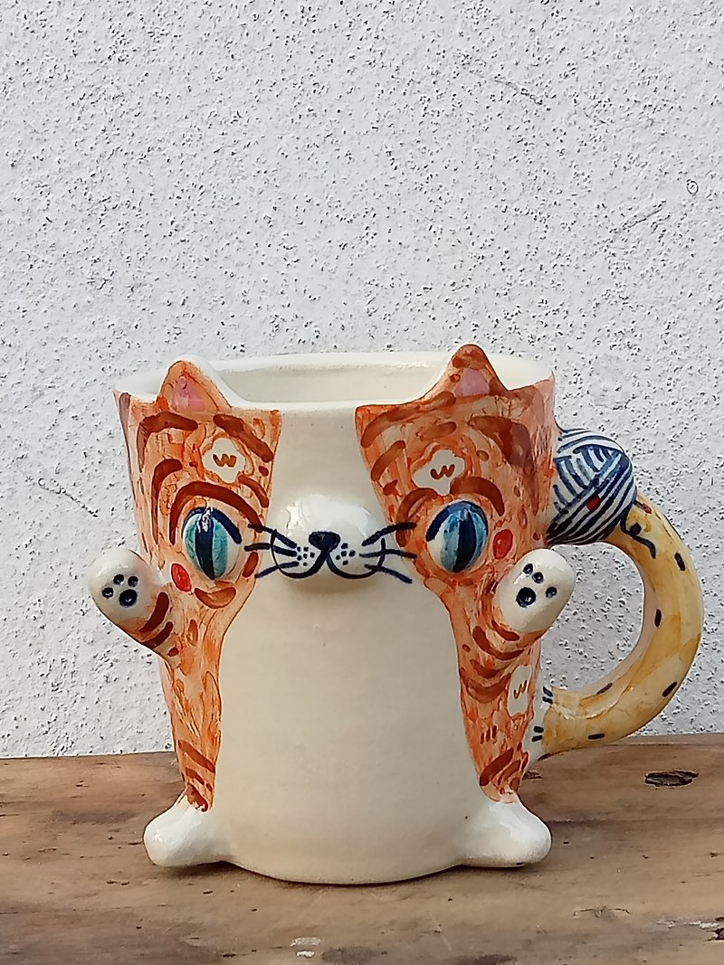 Ceramic mug in the shape of an orange cat playing with yarn. - Mugs - Porcelain Orange
