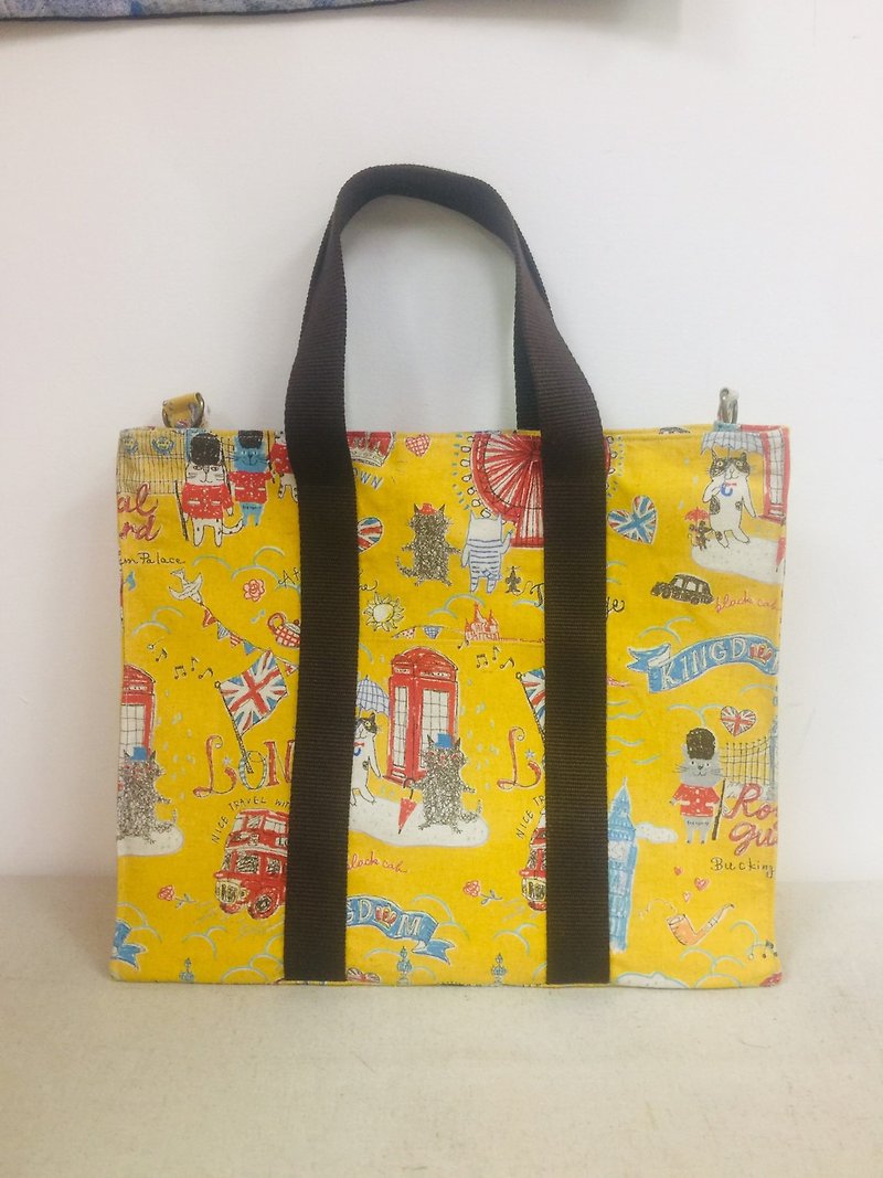 Yellow-bottomed London cat square hand bag with side back - กระเป๋าถือ - ผ้าฝ้าย/ผ้าลินิน สีเหลือง