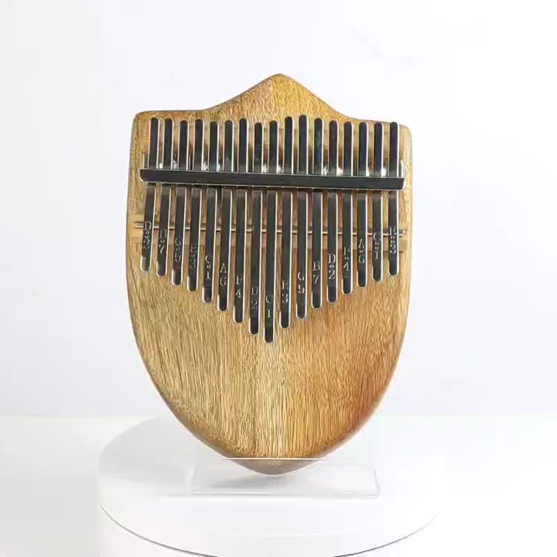 Shape yellow nanmu thumb piano/17 tone single board thumb piano/KALIMBA - กีตาร์เครื่องดนตรี - ไม้ สีทอง